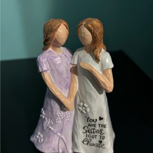 Sister Figurine with Purple and White Dresses